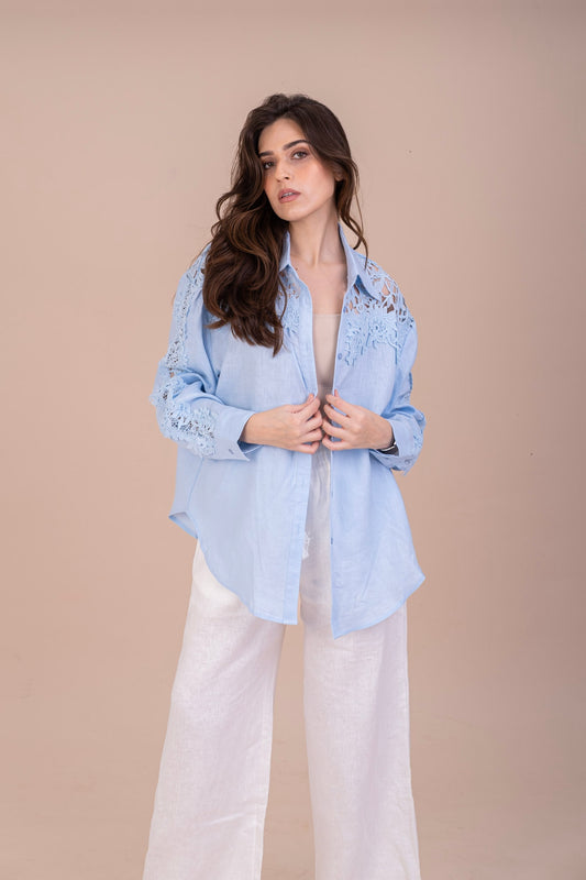 womans oversized pure linen shirt in light blue colour aired with white linen pants
