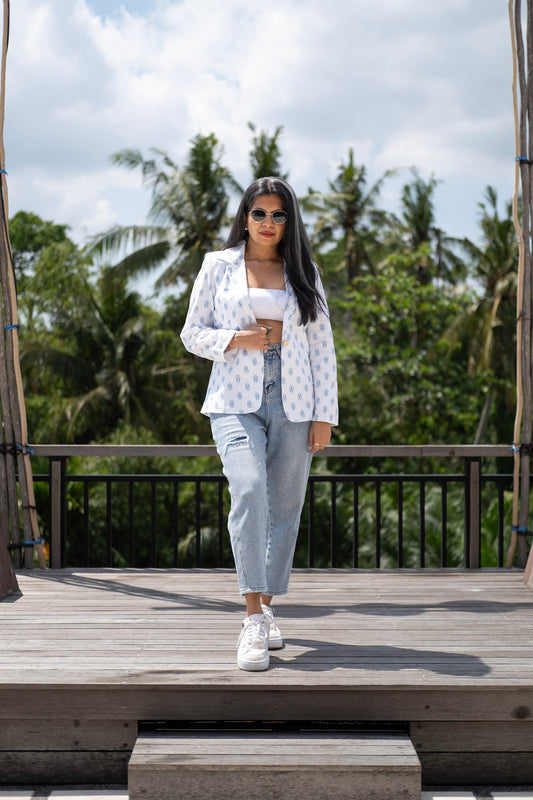 Tailored white cotton blazer for women, styled for smart casuals