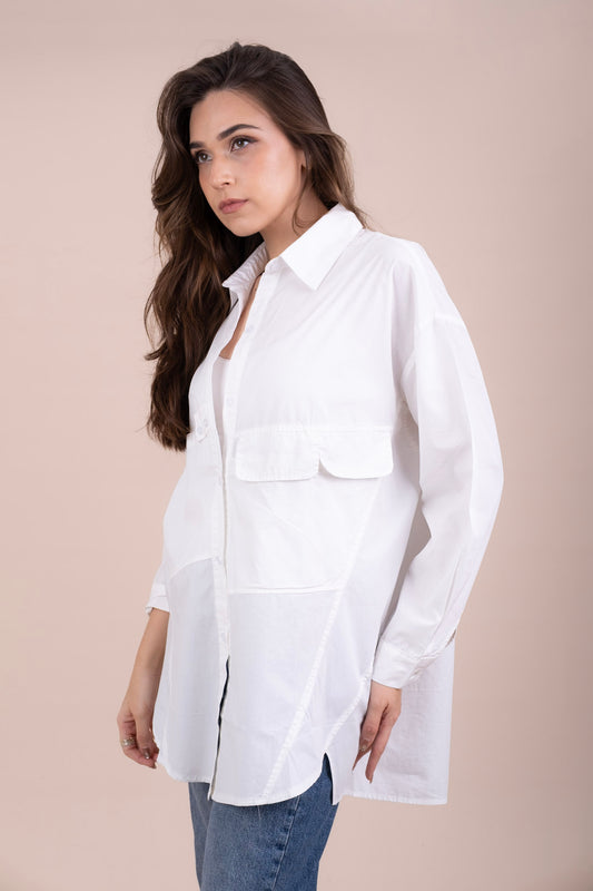 Women's white long-sleeve button-up oversized shirt with chest flap pockets.