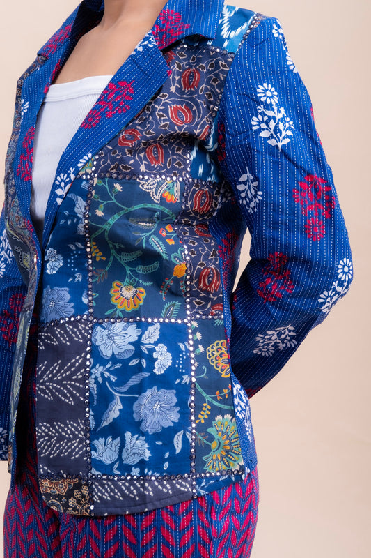 Close up of a pack work blue cotton blazer with lapel collar.